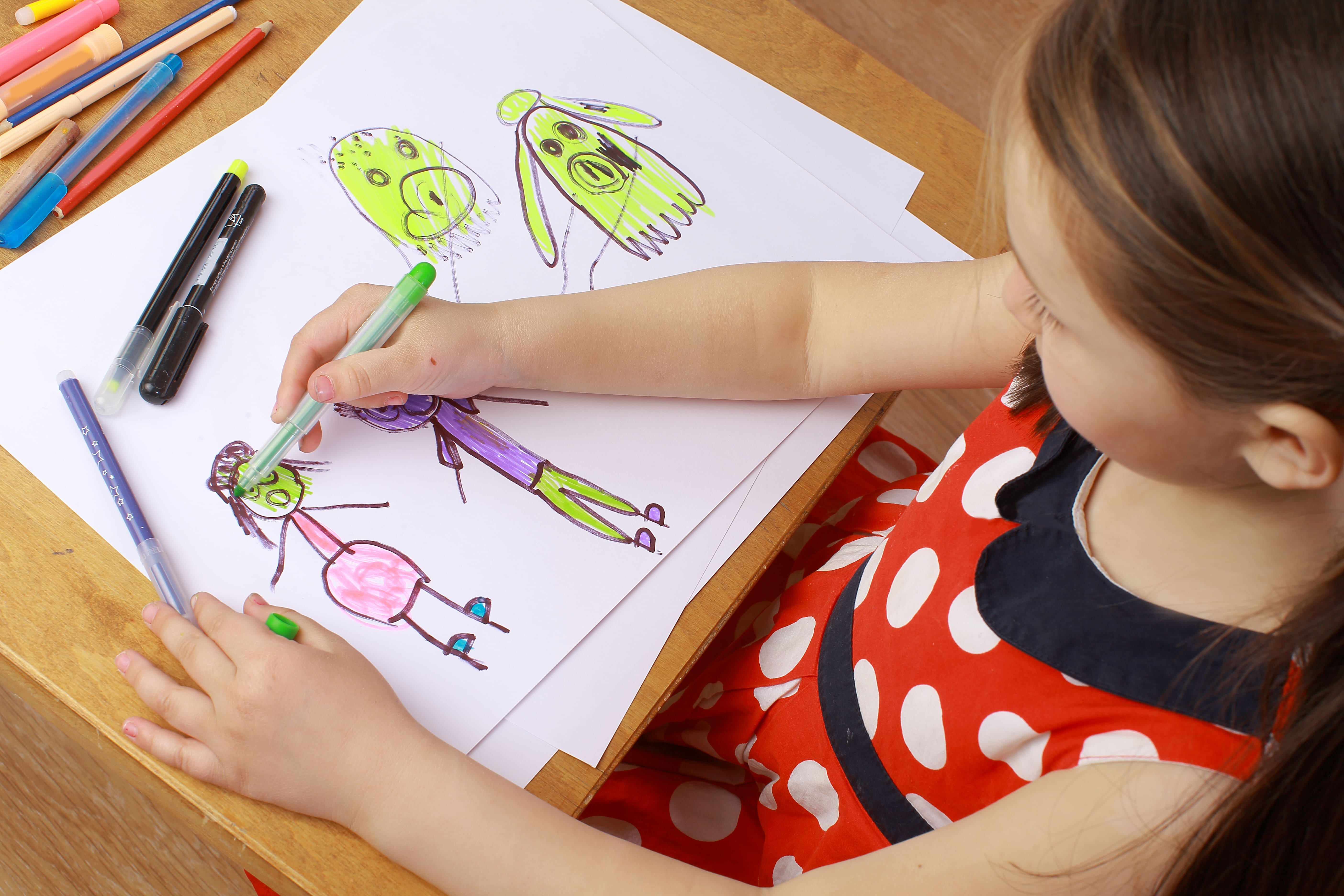 Little girl colouring in